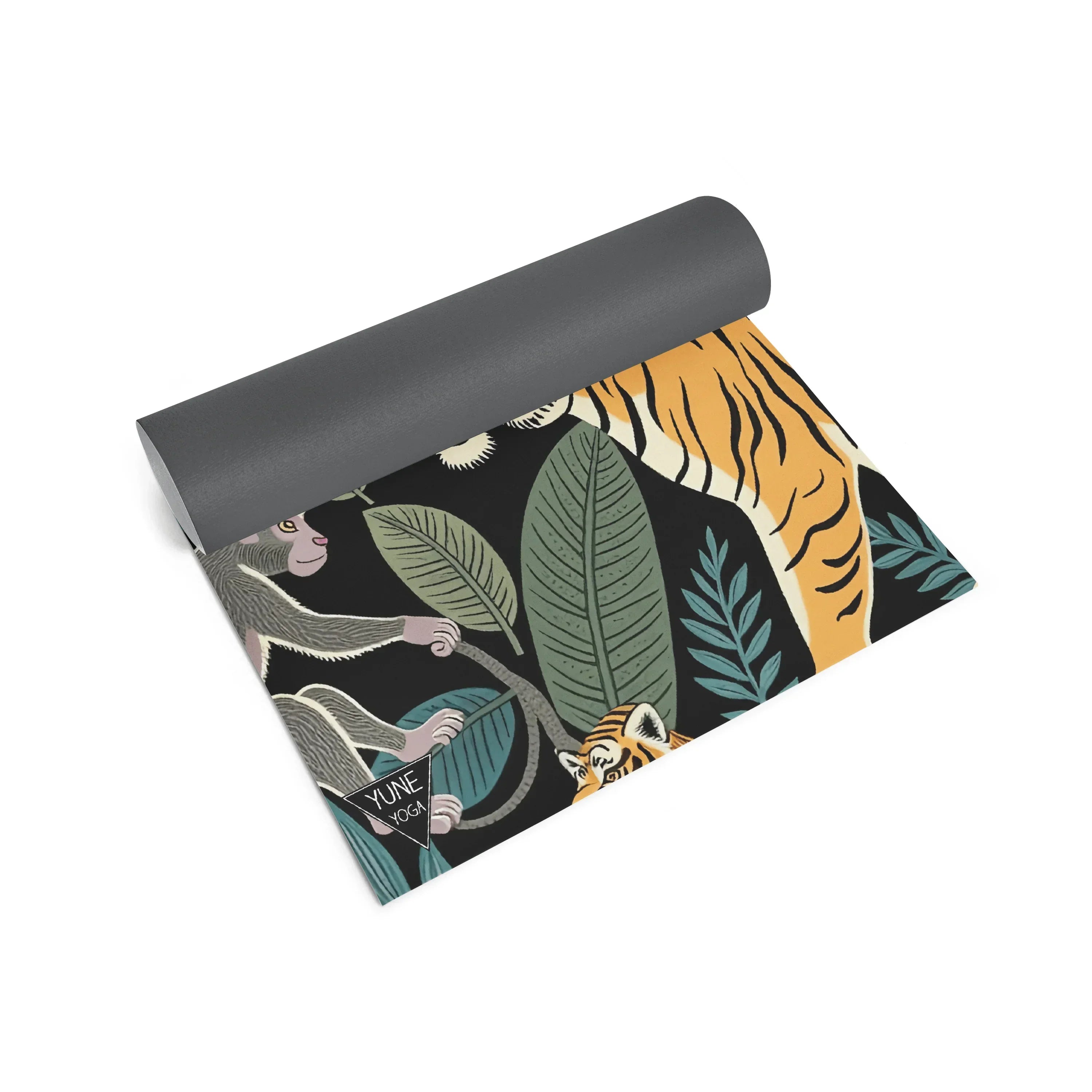 Neon jungle print yoga mat with tiger, monkey, and tropical leaves design