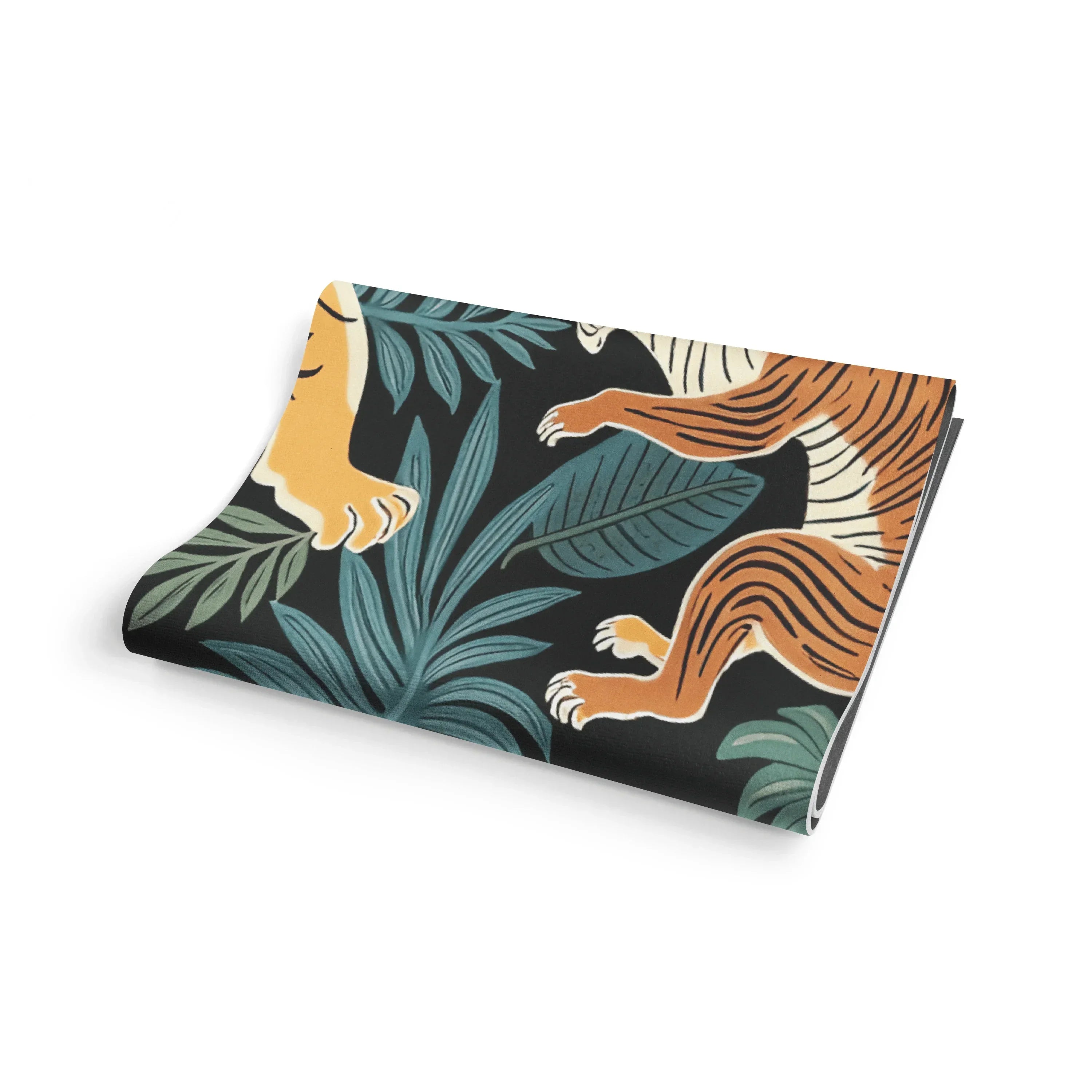 folded yoga mat with colorful tiger and jungle leaf animal print pattern