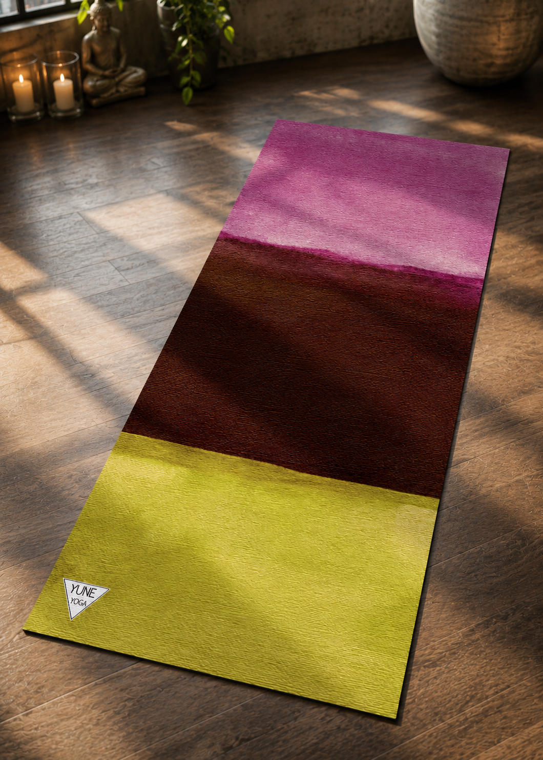 Colorful yoga mat on a wooden floor with a blurred background